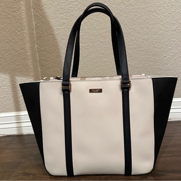 kate spade Handbags - Kate Spade cream and black tote. Style # 0102760